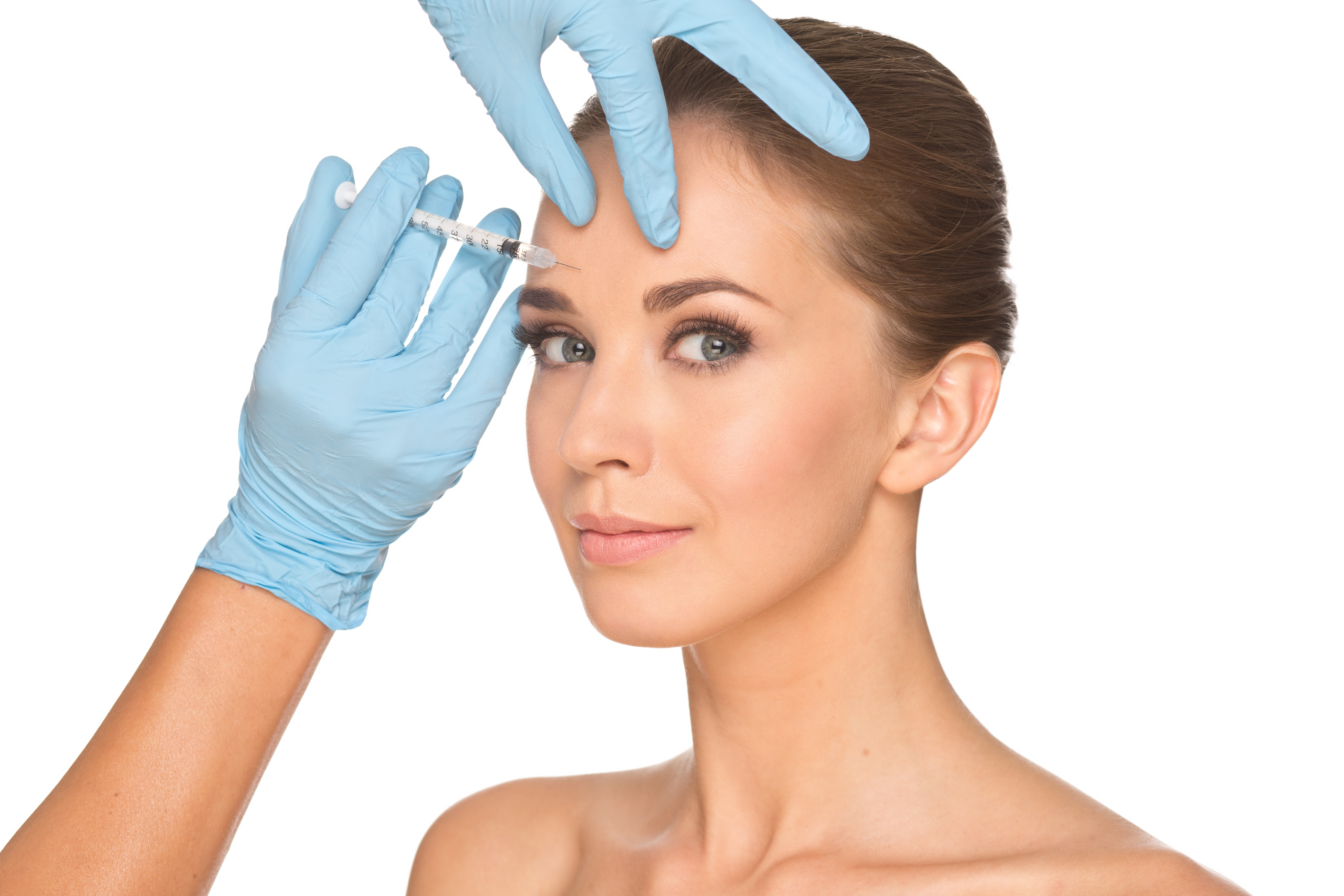 Attractive young woman gets cosmetic injection of botox. botox near me new forest