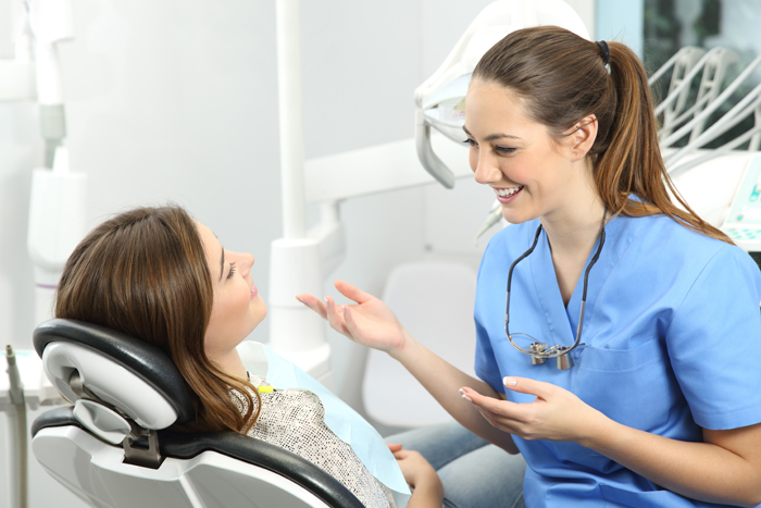 Dentist explaining procedure to a patient General Dentistry, Dibden Purlieu